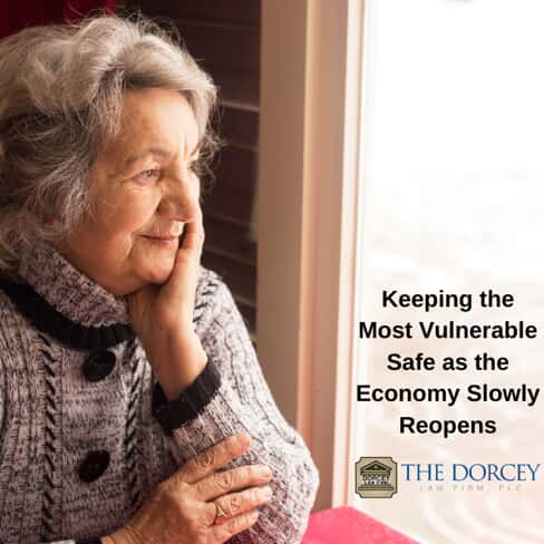 Elderly Woman Looking Out a Window